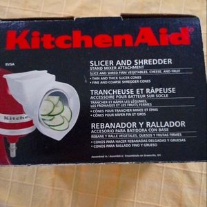 Pre-owned kitchen Aid, slicer, and shredder.